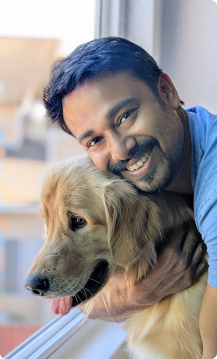 Tushar Roy with his golden retriever Rex